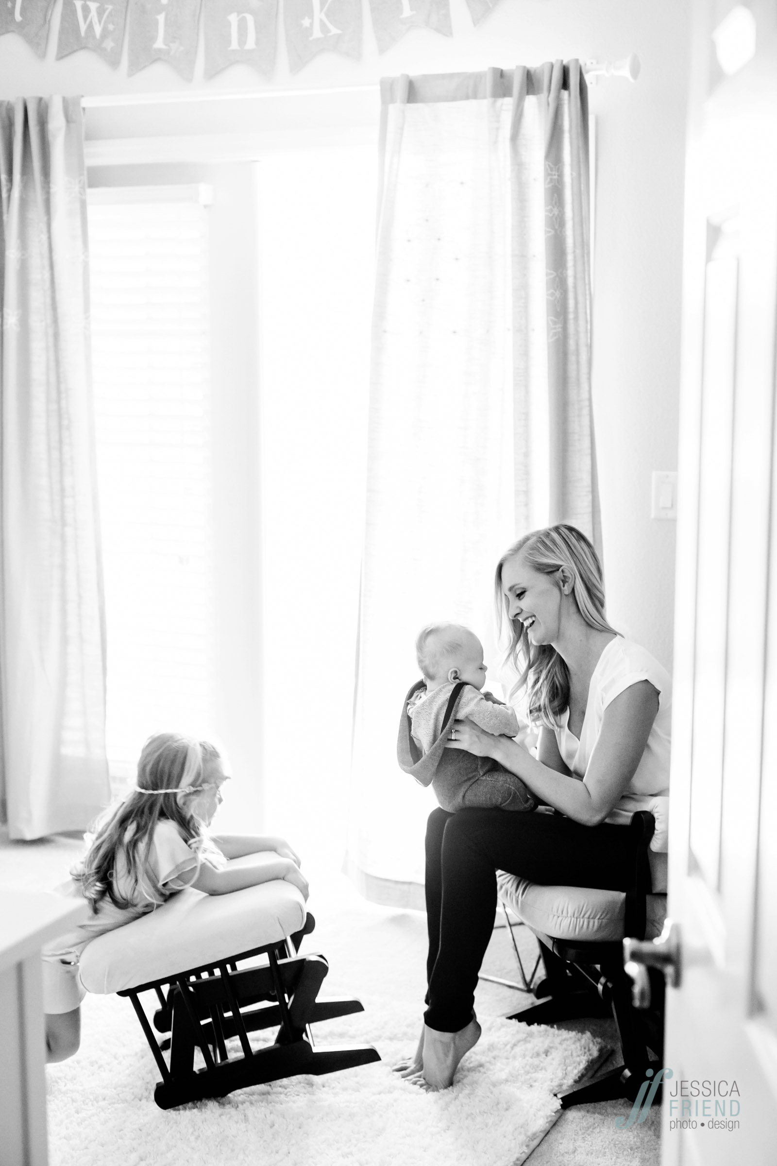mom in nursery | pregnancy photography orlando